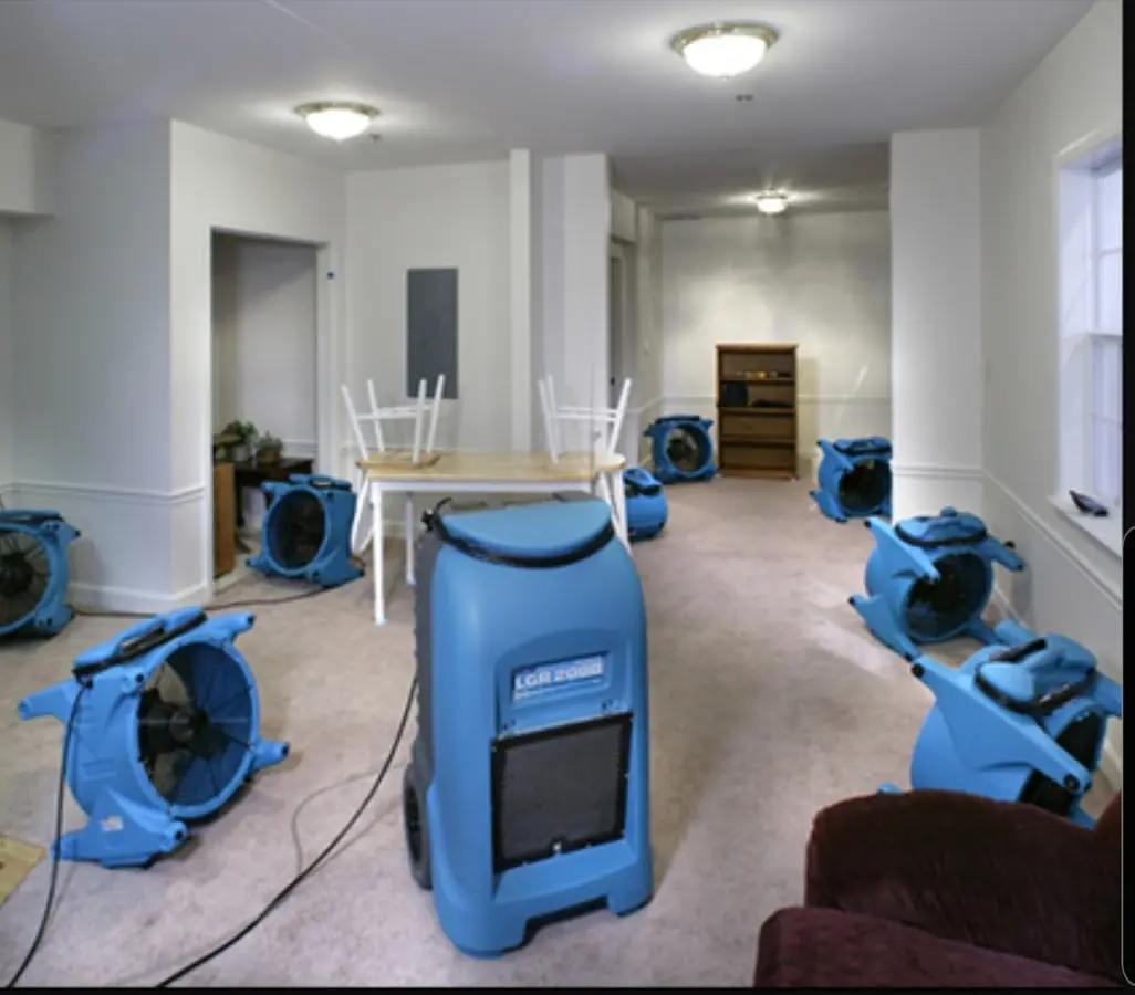 Air movers and dehumidifier setup for Water Damage Restoration in Nuevo